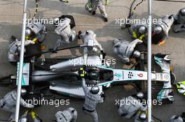 Nico Rosberg (GER) Mercedes AMG F1 W05 pit stop. 30.03.2014. Formula 1 World Championship, Rd 2, Malaysian Grand Prix, Sepang, Malaysia, Sunday.