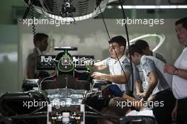 McLaren prepare the McLaren MP4-29 between FP3 and qualifying. 29.03.2014. Formula 1 World Championship, Rd 2, Malaysian Grand Prix, Sepang, Malaysia, Saturday.