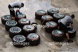 Pirelli tyres are washed by Mercedes AMG F1 mechanics. 29.03.2014. Formula 1 World Championship, Rd 2, Malaysian Grand Prix, Sepang, Malaysia, Saturday.