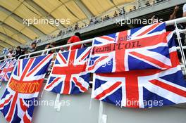 Lewis Hamilton (GBR) Mercedes AMG F1 flags. 30.03.2014. Formula 1 World Championship, Rd 2, Malaysian Grand Prix, Sepang, Malaysia, Sunday.