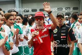 Fernando Alonso (ESP) Ferrari on the drivers parade. 30.03.2014. Formula 1 World Championship, Rd 2, Malaysian Grand Prix, Sepang, Malaysia, Sunday.