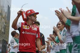 Fernando Alonso (ESP) Ferrari on the drivers parade. 30.03.2014. Formula 1 World Championship, Rd 2, Malaysian Grand Prix, Sepang, Malaysia, Sunday.