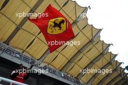 A Ferrari flag and fan. 30.03.2014. Formula 1 World Championship, Rd 2, Malaysian Grand Prix, Sepang, Malaysia, Sunday.