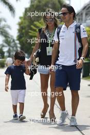 Felipe Massa (BRA) Williams with his son Felipinho Massa (BRA), wife Rafaela Bassi (BRA). 30.03.2014. Formula 1 World Championship, Rd 2, Malaysian Grand Prix, Sepang, Malaysia, Sunday.