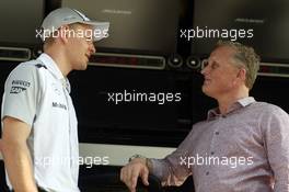 (L to R): Kevin Magnussen (DEN) McLaren with Johnny Herbert (GBR). 27.03.2014. Formula 1 World Championship, Rd 2, Malaysian Grand Prix, Sepang, Malaysia, Thursday.