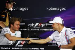 (L to R): Nico Rosberg (GER) Mercedes AMG F1 and Valtteri Bottas (FIN) Williams in the FIA Press Conference. 27.03.2014. Formula 1 World Championship, Rd 2, Malaysian Grand Prix, Sepang, Malaysia, Thursday.