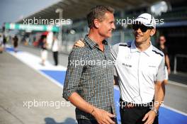 (L to R): David Coulthard (GBR) Red Bull Racing and Scuderia Toro Advisor / BBC Television Commentator with Jenson Button (GBR) McLaren. 27.03.2014. Formula 1 World Championship, Rd 2, Malaysian Grand Prix, Sepang, Malaysia, Thursday.