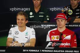 (L to R): Nico Rosberg (GER) Mercedes AMG F1 and Kimi Raikkonen (FIN) Ferrari in the FIA Press Conference. 27.03.2014. Formula 1 World Championship, Rd 2, Malaysian Grand Prix, Sepang, Malaysia, Thursday.