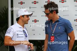 (L to R): Felipe Massa (BRA) Williams with Bruno Senna (BRA). 27.03.2014. Formula 1 World Championship, Rd 2, Malaysian Grand Prix, Sepang, Malaysia, Thursday.