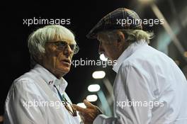 (L to R): Bernie Ecclestone (GBR) with Jackie Stewart (GBR). 19.09.2014. Formula 1 World Championship, Rd 14, Singapore Grand Prix, Singapore, Singapore, Practice Day.