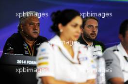 (L to R): Dr. Vijay Mallya (IND) Sahara Force India F1 Team Owner and Dr. Manfredi Ravetto (ITA) Caterham F1 Team Principal in the FIA Press Conference. 19.09.2014. Formula 1 World Championship, Rd 14, Singapore Grand Prix, Singapore, Singapore, Practice Day.