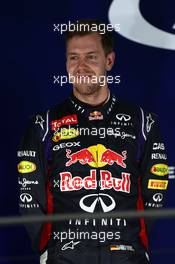 2nd place Sebastian Vettel (GER) Red Bull Racing RB10. 21.09.2014. Formula 1 World Championship, Rd 14, Singapore Grand Prix, Singapore, Singapore, Race Day.
