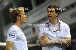 (L to R): Nico Rosberg (GER) Mercedes AMG F1 with Toto Wolff (GER) Mercedes AMG F1 Shareholder and Executive Director. 21.09.2014. Formula 1 World Championship, Rd 14, Singapore Grand Prix, Singapore, Singapore, Race Day.
