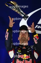 2nd place Sebastian Vettel (GER) Red Bull Racing RB10. 21.09.2014. Formula 1 World Championship, Rd 14, Singapore Grand Prix, Singapore, Singapore, Race Day.