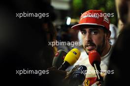 Fernando Alonso (ESP) Ferrari with the media. 20.09.2014. Formula 1 World Championship, Rd 14, Singapore Grand Prix, Singapore, Singapore, Qualifying Day.