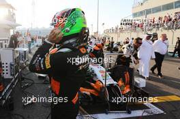 Sergio Perez (MEX) Sahara Force India F1 VJM07 on the grid. 23.11.2014. Formula 1 World Championship, Rd 19, Abu Dhabi Grand Prix, Yas Marina Circuit, Abu Dhabi, Race Day.