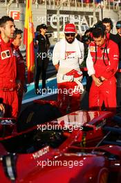 (L to R): Fernando Alonso (ESP) Ferrari with Andrea Stella (ITA) Ferrari Race Engineer on the grid. 23.11.2014. Formula 1 World Championship, Rd 19, Abu Dhabi Grand Prix, Yas Marina Circuit, Abu Dhabi, Race Day.