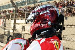 Fernando Alonso (ESP) Ferrari on the grid. 23.11.2014. Formula 1 World Championship, Rd 19, Abu Dhabi Grand Prix, Yas Marina Circuit, Abu Dhabi, Race Day.
