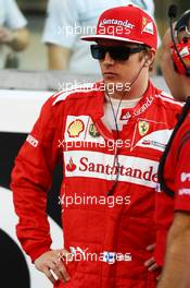 Kimi Raikkonen (FIN) Ferrari on the grid. 23.11.2014. Formula 1 World Championship, Rd 19, Abu Dhabi Grand Prix, Yas Marina Circuit, Abu Dhabi, Race Day.