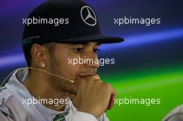 (L to R): Race winner and World Champion Lewis Hamilton (GBR) Mercedes AMG F1 in the FIA Press Conference. 23.11.2014. Formula 1 World Championship, Rd 19, Abu Dhabi Grand Prix, Yas Marina Circuit, Abu Dhabi, Race Day.