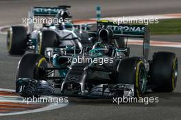 Nico Rosberg (GER) Mercedes AMG F1 W05 leads team mate Lewis Hamilton (GBR) Mercedes AMG F1 W05. 23.11.2014. Formula 1 World Championship, Rd 19, Abu Dhabi Grand Prix, Yas Marina Circuit, Abu Dhabi, Race Day.