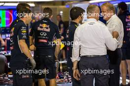 The Red Bull Racing RB10 of Sebastian Vettel (GER) Red Bull Racing is inspected Jo Bauer (GER) FIA Delegate. 22.11.2014. Formula 1 World Championship, Rd 19, Abu Dhabi Grand Prix, Yas Marina Circuit, Abu Dhabi, Qualifying Day.