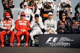 The drivers at the end of season group photograph. 23.11.2014. Formula 1 World Championship, Rd 19, Abu Dhabi Grand Prix, Yas Marina Circuit, Abu Dhabi, Race Day.