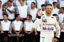 Jenson Button (GBR) McLaren at a team photograph. 20.11.2014. Formula 1 World Championship, Rd 19, Abu Dhabi Grand Prix, Yas Marina Circuit, Abu Dhabi, Preparation Day.
