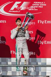 Race winner Lewis Hamilton (GBR) Mercedes AMG F1 celebrates on the podium. 02.11.2014. Formula 1 World Championship, Rd 17, United States Grand Prix, Austin, Texas, USA, Race Day.