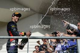 Daniel Ricciardo (AUS) Red Bull Racing celebrates his third position on the podium. 02.11.2014. Formula 1 World Championship, Rd 17, United States Grand Prix, Austin, Texas, USA, Race Day.