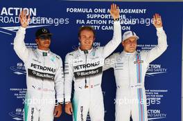 Qualifying top three in parc ferme (L to R): Lewis Hamilton (GBR) Mercedes AMG F1, second; Nico Rosberg (GER) Mercedes AMG F1, pole position; Valtteri Bottas (FIN) Williams, third. 01.11.2014. Formula 1 World Championship, Rd 17, United States Grand Prix, Austin, Texas, USA, Qualifying Day.