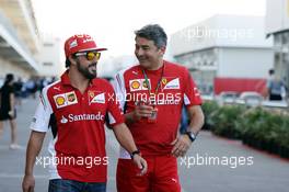 (L to R): Fernando Alonso (ESP) Ferrari with Marco Mattiacci (ITA) Ferrari Team Principal. 30.10.2014. Formula 1 World Championship, Rd 17, United States Grand Prix, Austin, Texas, USA, Preparation Day.