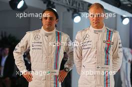 (L to R): Felipe Massa (BRA) Williams with team mate Valtteri Bottas (FIN) Williams. 06.03.2014. Formula One Launch, Williams FW36 Official Unveiling, London, England.