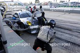 Pitstop John Potter (USA) Andy Lally (USA) Marco Seefried (GER) Magnus Racing Porsche 911 GT 15.03.2014. 12 Hours of Sebring, Friday, Sebring, USA.