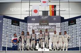 The podium (L to R): Kazuki Nakajima (JPN); Stephane Sarrazin (FRA); Alexander Wurz (AUT) #07 Toyota Racing Toyota TS040 Hybrid, second; Anthony Davidson (GBR) /  Sebastien Buemi (SUI) #08 Toyota Racing Toyota TS040 Hybrid, race winners; Romain Dumas (FRA) / Neel Jani (SUI) / Marc Lieb (GER) #14 Porsche Team Porsche 919 Hybrid, third. 02.11.2014. FIA World Endurance Championship, Round 6, Six Hours of Shanghai, Shanghai, China, Sunday.