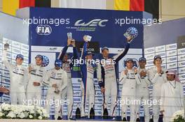 The podium (L to R): Romain Dumas (FRA); Marc Lieb (GER); Neel Jani (SUI) #14 Porsche Team Porsche 919 Hybrid, second; Stephane Sarrazin (FRA); Mike Conway (GBR); Alexander Wurz (AUT) #07 Toyota Racing Toyota TS040 Hybrid, race winners; Timo Bernhard (GER); Mark Webber (AUS); Brendon Hartley (NZL) #20 Porsche Team Porsche 919 Hybrid, third.   15.11.2014. FIA World Endurance Championship, Round 7, Six Hours of Bahrain, Sakhir, Bahrain, Saturday.