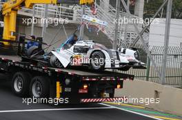 The #20 Porsche Team Porsche 919 Hybrid is recovered back to the pits on the back of a truck after Mark Webber (AUS) crashed out of the race. 30.11.2014. FIA World Endurance Championship, Round 8, Six Hours of Sao Paulo, Interlagos, Sao Paulo, Brazil. Sunday.