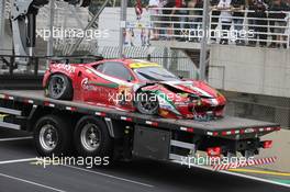  The #90 8 Star Motorsports Ferrari F458 Italia, driven by Matteo Cressoni (ITA) is recovered back to the pits on the back of a truck after he crashed out of the race. 30.11.2014. FIA World Endurance Championship, Round 8, Six Hours of Sao Paulo, Interlagos, Sao Paulo, Brazil. Sunday.