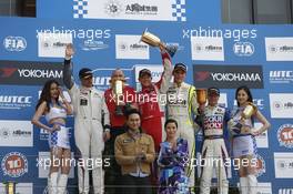 Winner race 2 Robert Huff (GBR), LADA Granta 1.6T, LADA Sport, 2nd Yvan Muller (FRA), Citroen C-Elysee WTCC, Citroen Total WTCC, 3rd Hugo Valente (ESP), Chevrolet RML Cruze TC1, Campos Racing 16.11.2014. World Touring Car Championship, Rounds 23 and 24, Macau, China.
