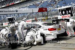 Pitstop, Martin Tomczyk (GER) BMW Team Schnitzer BMW M4 DTM 29.05.2015, DTM Round 2, Lausitzring, Germany, Friday.