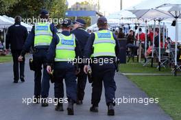 Police in the paddock. 13.03.2015. Formula 1 World Championship, Rd 1, Australian Grand Prix, Albert Park, Melbourne, Australia, Practice Day.