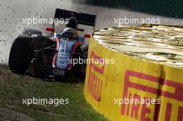 Kevin Magnussen (DEN) McLaren MP4-30 crashes in the first practice session. 13.03.2015. Formula 1 World Championship, Rd 1, Australian Grand Prix, Albert Park, Melbourne, Australia, Practice Day.