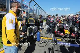 Cyril Abiteboul (FRA) Renault Sport F1 Managing Director on the grid looking at the Red Bull Racing RB11 of Daniel Ricciardo (AUS) Red Bull Racing. 15.03.2015. Formula 1 World Championship, Rd 1, Australian Grand Prix, Albert Park, Melbourne, Australia, Race Day.