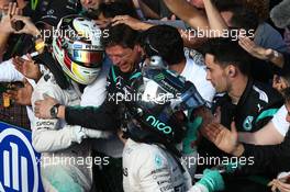 Lewis Hamilton (GBR) Mercedes AMG F1 W06 and Nico Rosberg (GER) Mercedes AMG F1 W06. 15.03.2015. Formula 1 World Championship, Rd 1, Australian Grand Prix, Albert Park, Melbourne, Australia, Race Day.