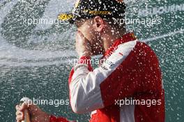 Sebastian Vettel (GER) Ferrari celebrates his third position on the podium. 15.03.2015. Formula 1 World Championship, Rd 1, Australian Grand Prix, Albert Park, Melbourne, Australia, Race Day.