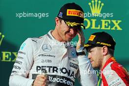 Nico Rosberg (GER) Mercedes AMG F1 celebrates his second position on the podium. 15.03.2015. Formula 1 World Championship, Rd 1, Australian Grand Prix, Albert Park, Melbourne, Australia, Race Day.