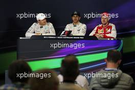 The post race FIA Press Conference (L to R): Nico Rosberg (GER) Mercedes AMG F1, second; Lewis Hamilton (GBR) Mercedes AMG F1, race winner; Sebastian Vettel (GER) Ferrari, third. 15.03.2015. Formula 1 World Championship, Rd 1, Australian Grand Prix, Albert Park, Melbourne, Australia, Race Day.