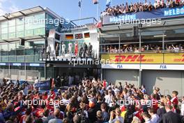 The podium (L to R): Nico Rosberg (GER) Mercedes AMG F1, second; Lewis Hamilton (GBR) Mercedes AMG F1, race winner; Sebastian Vettel (GER) Ferrari, third. 15.03.2015. Formula 1 World Championship, Rd 1, Australian Grand Prix, Albert Park, Melbourne, Australia, Race Day.