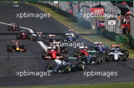 Lewis Hamilton (GBR) Mercedes AMG F1 W06 leads at the start of the race. 15.03.2015. Formula 1 World Championship, Rd 1, Australian Grand Prix, Albert Park, Melbourne, Australia, Race Day.