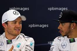 (L to R): Nico Rosberg (GER) Mercedes AMG F1 with team mate Lewis Hamilton (GBR) Mercedes AMG F1 in the FIA Press Conference. 14.03.2015. Formula 1 World Championship, Rd 1, Australian Grand Prix, Albert Park, Melbourne, Australia, Qualifying Day.